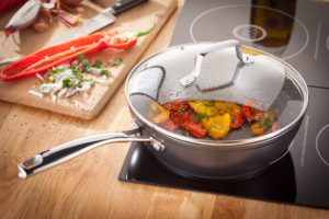 SP48 Stellar Rocktanium 24cm Saute Pan lifestyle Rock Hard – Stellar Rocktanium adds cookware