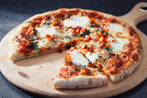 SW92 Stellar Kitchen Beech Pizza Serving Board 30 x 1.5cm Propped 1 Stellar's New Beechware Chopping Board Collection