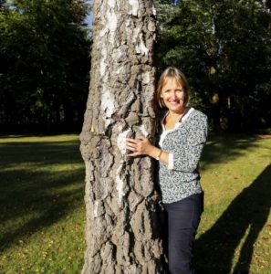 Sarah Squire Squires Chairman next to a Silver Birch tree Squire’s Garden Centres to donate 300 silver birch trees to the community