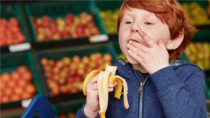 Tesco kid banana 1 Tesco gives away over 30 million pieces of free fruit to kids